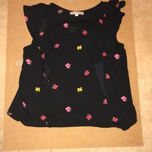 Ann Taylor Loft black top w/ flowers on it.